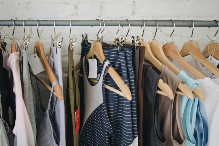 Clothes Hanging on Rack
